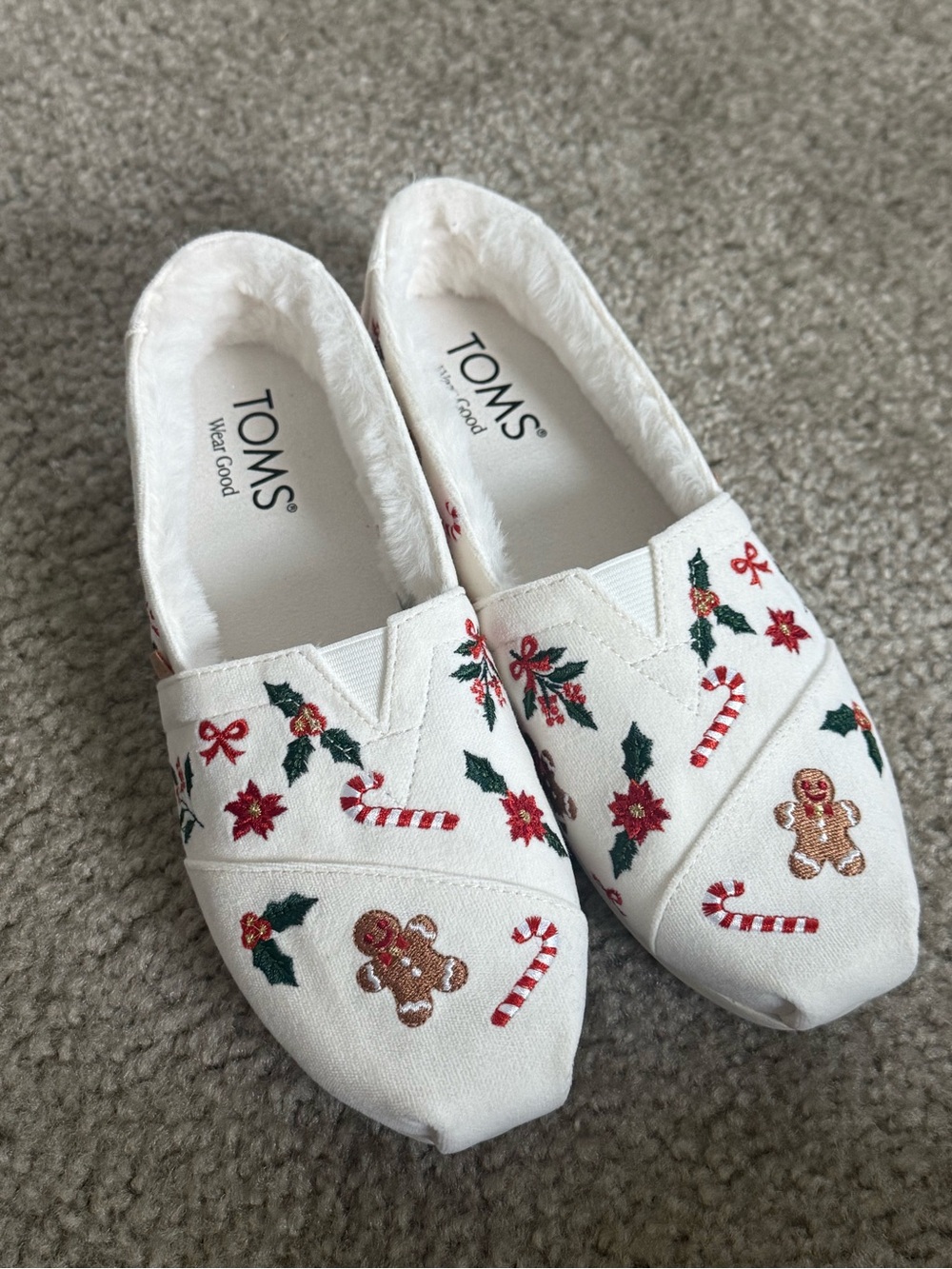 TOMS Women’s White Holiday Embroidered Slip-Ons